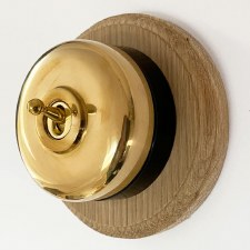 Round Dolly Light Switch 1 Gang Polished Brass Black Base