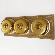 Round Dolly Light Switch 3 Gang on Oak Base Polished Brass White Round Dolly Light Switch 3 Gang on Oak Base Polished Brass White