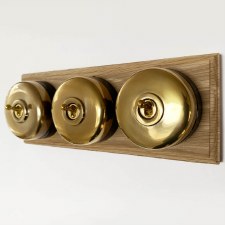 Round Dolly Light Switch 3 Gang on Oak Base Renovated Brass Black