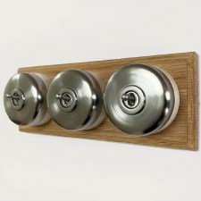 Round Dolly Light Switch 3 Gang on Oak Base Satin Chrome White