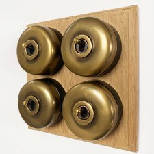 Round Dolly Light Switch 4 Gang on Oak Base Antique Satin Brass Black