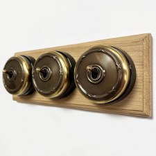 Reed and Ribbon Dome Dolly Light Switch 3 Gang Renovated Brass Black