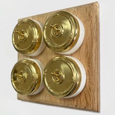 Reed and Ribbon Dome Dolly Light Switch 4 Gang Polished Brass Unlacquered White