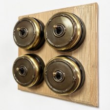 Reed and Ribbon Dome Dolly Light Switch 4 Gang Renovated Brass Black