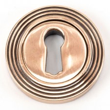 From The Anvil Round Escutcheon Beehive Polished Bronze