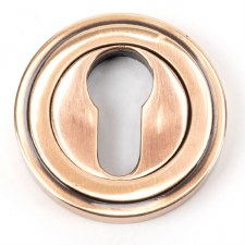 From The Anvil Round Euro Profile Escutcheon Art Deco Polished Bronze