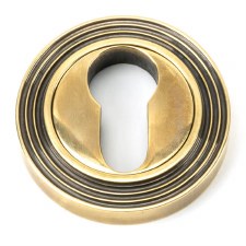 From The Anvil Round Euro Profile Escutcheon Beehive Aged Brass