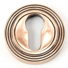 From The Anvil Round Euro Profile Escutcheon Beehive Polished Bronze