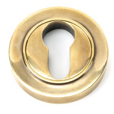 From The Anvil Round Euro Profile Escutcheon Plain Aged Brass