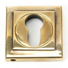 From The Anvil Round Euro Profile Escutcheon Square Aged Brass