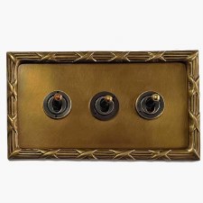 Reed and Ribbon Dolly Switch 3 Gang Antique Satin Brass