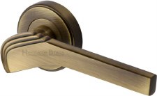 Heritage Tiffany Round Rose Door Handles TIF1926 Antique Brass Lacq Heritage Tiffany Round Rose Door Handles TIF1926 Antique Brass Lacq