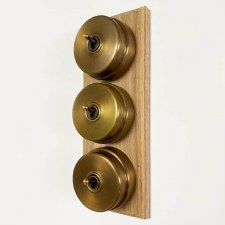 Additional picture of Citadel Dolly Switch on Wooden Base 3 Gang Antique Satin Brass