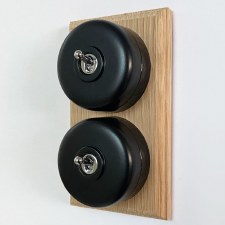 Additional picture of Round Dolly Light Switch 2 Gang Black on Oak Pattress with Black Mounts