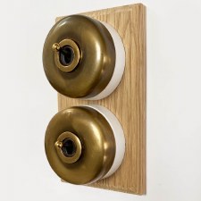 Additional picture of Round Dolly Light Switch on Oak Base Antique Satin Brass 2 Gang