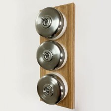 Additional picture of Round Dolly Light Switch 3 Gang on Oak Base Satin Chrome White