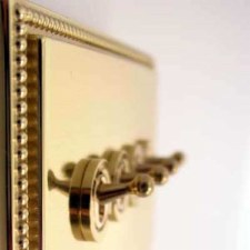 Additional picture of Regency Dolly Switch 4 Gang Polished Brass Unlacquered
