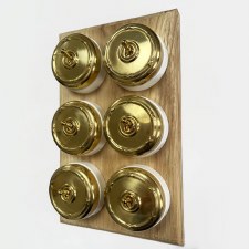 Additional picture of Reed and Ribbon Dome Dolly Light Switch 6 Gang Polished Brass Unlacquered