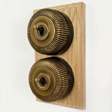 Additional picture of Reeded Round Dolly Light Switch on Oak Base Antique Satin Brass 2 Gang