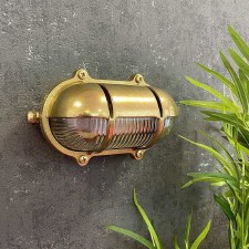 Additional picture of Eyelid Slot Outdoor Bulkhead Light Raw Brass