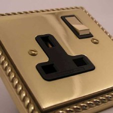 Additional picture of Georgian Switched Socket 1 Gang Polished Brass Lacquered & Black Trim