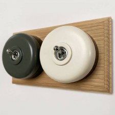 Additional picture of Round Dolly Light Switch 2 Gang Mix and Match on Oak Pattress with Black Mounts