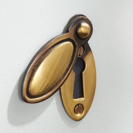 Oval Covered Escutcheon Renovated Brass