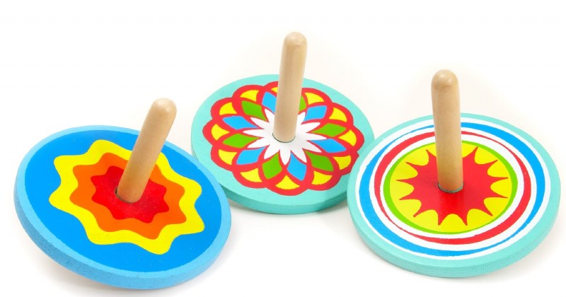 large wooden spinning tops