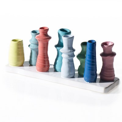 5" x 11" Eight Multicolored Vases on White Base