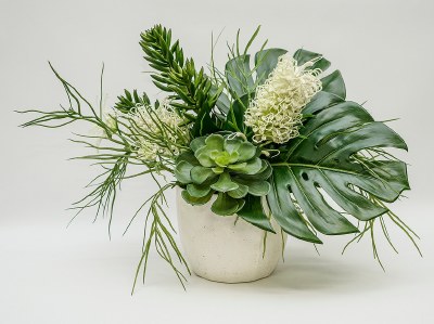 16" Faux Green Succulent and Tropical Leaf Arrangement in White Pot