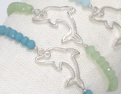 Green  Beads and Silver Toned Dolphin Bracelet