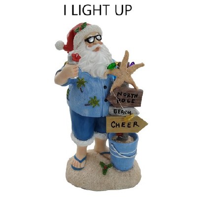 12" LED Polyresin Santa Wearing a Blue Outfit With a Beach Sign Statue
