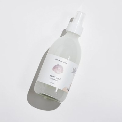 10 Oz Warm Sand Fragrance Linen Spray in a Glass Bottle