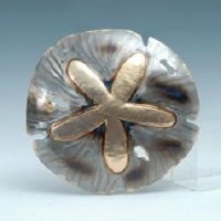 11" Round Silver and Gold Metal Sand Dollar Coastal Wall Art Plaque