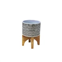 7" White and Black Pot With a Wood Stand