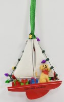 "Sanibel Island" Dog in a Sailboat With Presents Ornament