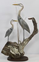 One Small and One Medium Blue Polyresin Heron on Driftwood