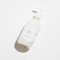 10 Oz Warm Sand Fragrance Body Lotion in a Glass Bottle