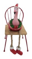 8" Christmas Flamingo Sitting on a Chair Wearing a Wreath