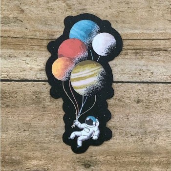 Astronaut with Planet Balloons