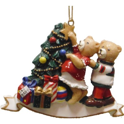 EXPECTING PARENTS DECORATING TREE