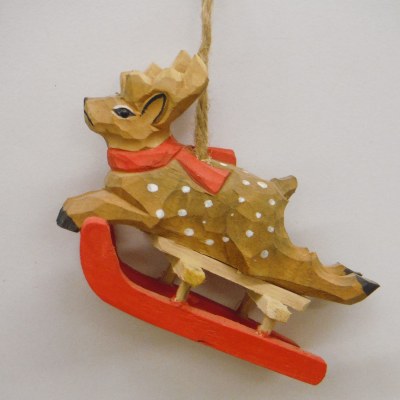 CARVED REINDEER ON SLED