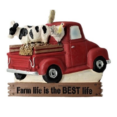 COW ON RED TRUCK