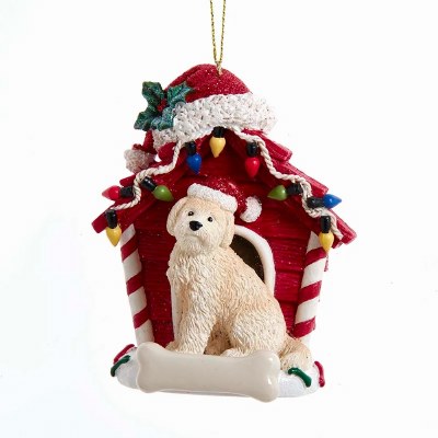 GOLDENDOODLE WITH DOG HOUSE