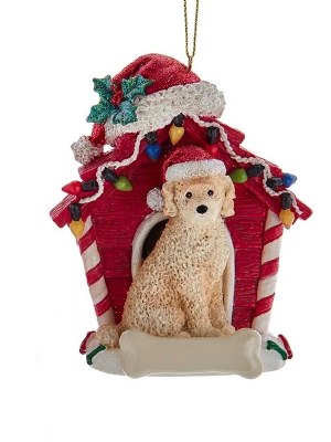 LABRADOODLE WITH DOG HOUSE