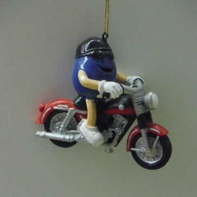 M&amp;M RIDING MOTORCYCLE