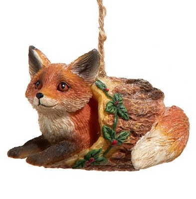 FOX IN A LOG