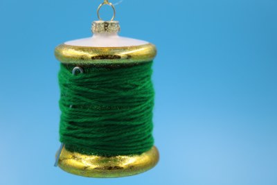 GREEN NEEDLE AND THREAD