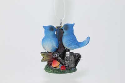 BLUE BIRD ON WATERING CAN
