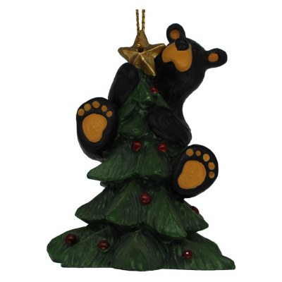 BEAR ON TREE TOP